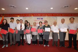 Vietnam News Agency marks Day of Invalids, Martyrs 
