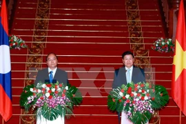 Lao PM urges joint efforts to deepen Vietnam-Laos ties 