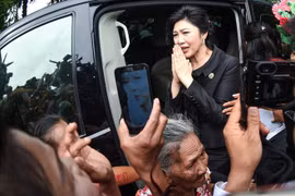 Thai police confirm former PM Yingluck had fled abroad