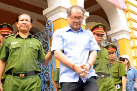 Higher court upholds 30-year jail term for former bank executive