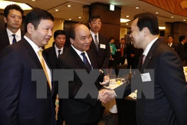 PM calls for Japanese investment in information technology