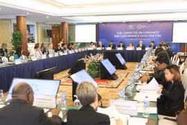 APEC officials continue to debate economic, health issues
