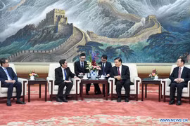 Nhan Dan newspaper delegation visits China
