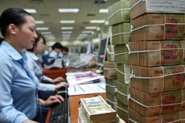 Reference exchange rate down 1 VND