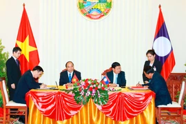 Vietnam, Laos issue joint statement