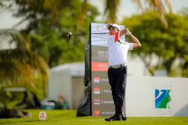 Ho Anh Duy competes in the last day of the Southeast Asian Amateur Golf Team Championships 2024. He wins the gold in the Lion City Cup for boys' U16. (Photos of VGA) 