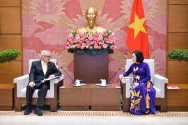 Vice Chairwoman of the National Assembly (NA) Nguyen Thi Thanh (R) and Chairman of the Thailand-Vietnam Parliamentarians’ Friendship Group Sakchai Tanaboonchai at their meeting in Hanoi on June 27 (Photo: VNA)