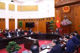 At the meeting in Hanoi on August 12 (Photo: VNA)