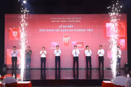 At the launch ceremony of the application Hanoi On on July 10. (Photo: VNA)
