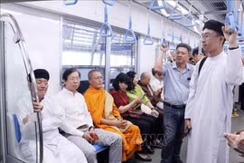 Delegates experience the HCM City's metro line No.1 service during the trial ride on June 8. (Photo: VNA)