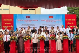 At the inauguration ceremony of the Thong Nhat secondary school in Laos's Khammouane province on August 31. (Photo: VNA)