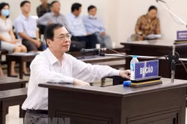 Ex-minister of industry and trade has jail term reduced by one year