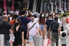 Singapore’s Omicron wave peaks, infections decline