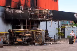 Indonesia: 19 killed in clash, fire at night club