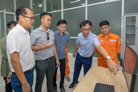 Vietnamese, Lao experts share experience in hydropower plant operation