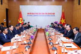 Vietnam, Laos share mass mobilisation experience