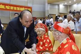 President attends ceremony for Action Month for Elderly in Hung Yen