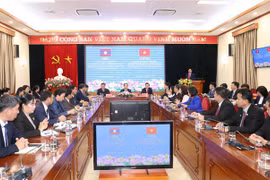 Vietnam, Laos share experience in mass mobilisation