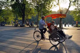 Cyclo touring attracts foreign tourists