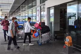 Daily COVID-19 cases in Singapore top 10,000 for first time