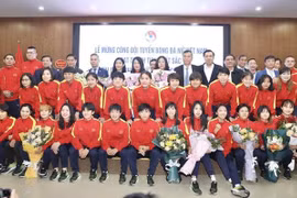 Women’s football team showered with bonuses
