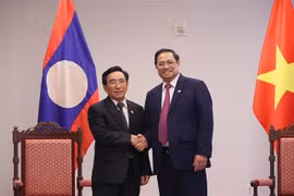 Prime Minister Pham Minh Chinh meets Lao counterpart in US