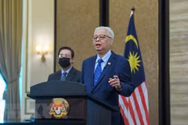 Japan agrees to hold summit with ASEAN next year