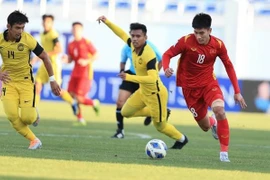 Vietnam defeat Malaysia 2-0, advance to U23 Asian Cup quarterfinals