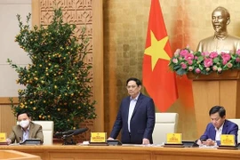 PM orders staying on duty round the clock to fight COVID-19 during Tet