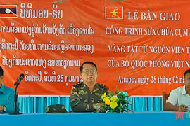 Projects funded by Vietnamese defence ministry handed over to Laos