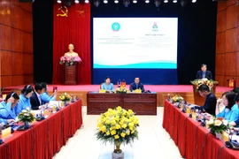 Vietnam, Laos promote trade union cooperation