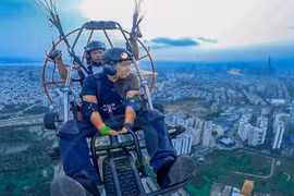 Admiring Ho Chi Minh City while paragliding