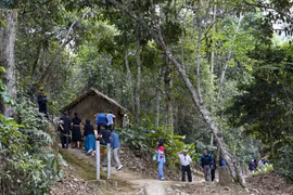 Returning to Muong Phang revolutionary base area 