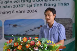 Director of the provincial Department of Agriculture and Rural Development Nguyen Van Vu Minh speaks at the event. (Photo: VNA)