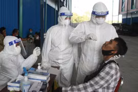 Indonesia sees highest daily COVID-19 new cases in three months