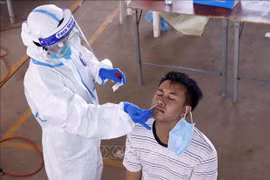 Laos, Malaysia post complicated developments of COVID-19