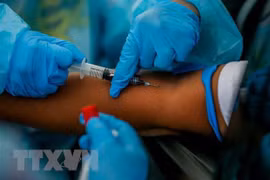 Philippines targets workers in next phase of COVID-19 vaccination 