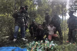 Three arrested for smuggling 46kg of crystal meth from Laos into Vietnam