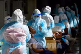 Thailand sees new daily record of COVID-19 deaths, Singapore probing re-infections