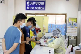 Laos to pilot school reopening from January 2022