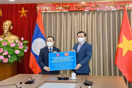 Capital cities of Vietnam, Laos foster multi-faceted cooperation
