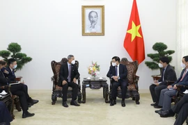 Deputy PM Pham Binh Minh receives visiting Singaporean Foreign Minister