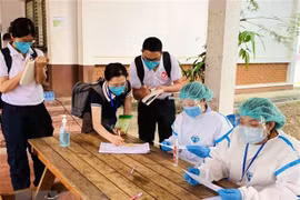 Laos applies compulsory quarantine to people having close contact with COVID-19 patients