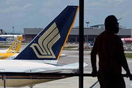 Singapore Airlines reports record annual net loss