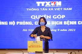 Vietnam News Agency’s staff raise funds for COVID-19 fight 