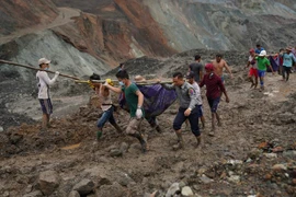 Myanmar steps up efforts to search for jade mine landslide victims