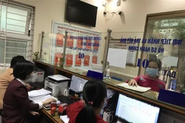 Hanoi workers return to work after Tet