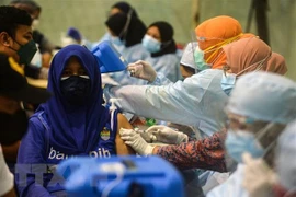 Indonesia continues to extend restrictions on community activities
