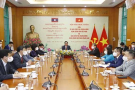 Party inspection commissions of Vietnam, Laos strengthen ties
