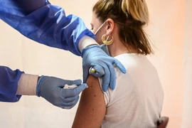 Singapore considers booster shots of COVID-19 vaccines, injections for kids under 12